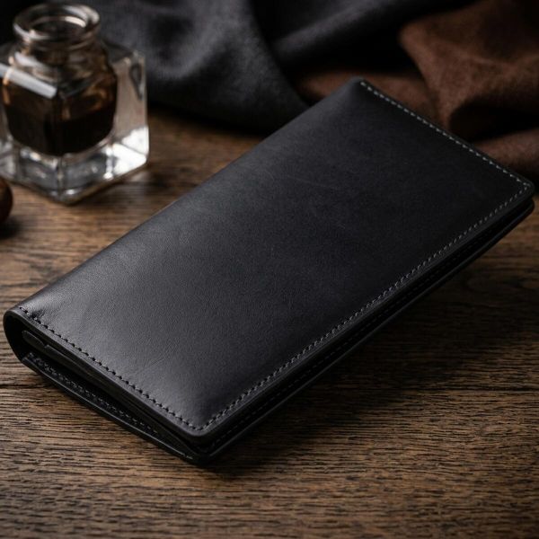 Вертикальный бумажник матовый на магнитной кнопке GRANDE PELLE 11313 Черный